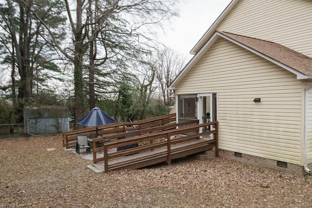 rear view of property with a deck