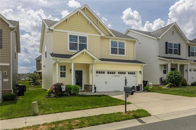 craftsman inspired home with a front yard, concrete driveway, a garage, and board and batten siding