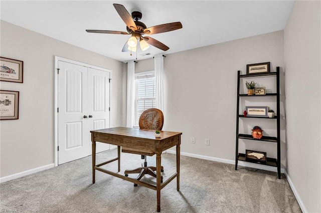 office with ceiling fan, carpet, baseboards, and visible vents