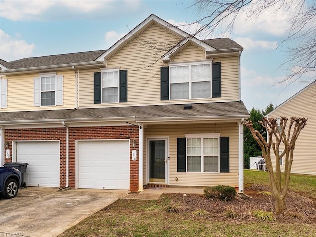 view of front of property with a garage