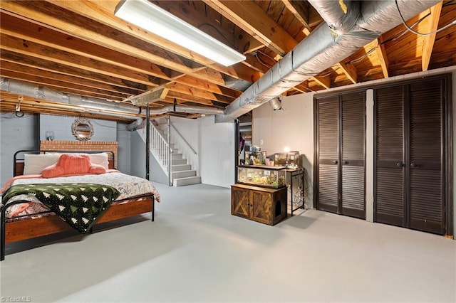 bedroom with concrete floors