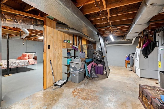 unfinished basement with washer / dryer