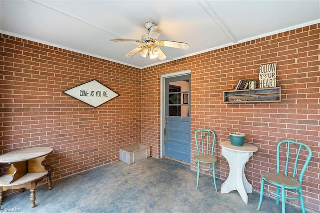 view of patio featuring ceiling fan