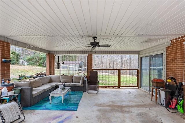 view of patio featuring a ceiling fan and outdoor lounge area