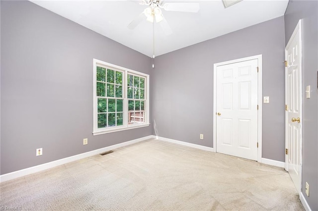 4904 Landaff Dr, Greensboro, NC 27406 - unfurnished bedroom featuring carpet flooring, baseboards, and a ceiling fan