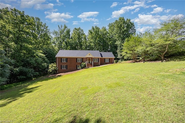 4904 Landaff Dr, Greensboro, NC 27406 - rear view of house featuring a yard