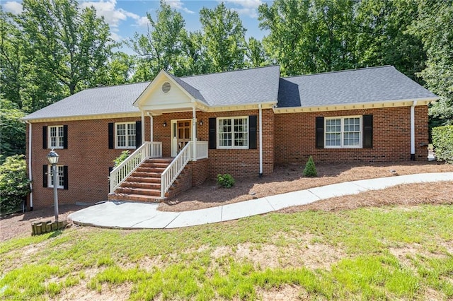 4904 Landaff Dr, Greensboro, NC 27406 - single story home featuring brick siding and a front lawn