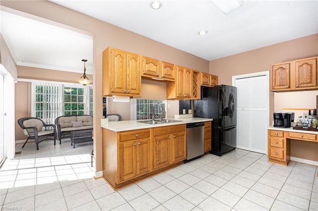 4904 Landaff Dr, Greensboro, NC 27406 - kitchen featuring a sink, stainless steel dishwasher, black fridge, light countertops, and light tile patterned flooring
