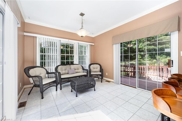 4904 Landaff Dr, Greensboro, NC 27406 - living area featuring ornamental molding, baseboards, and light tile patterned flooring