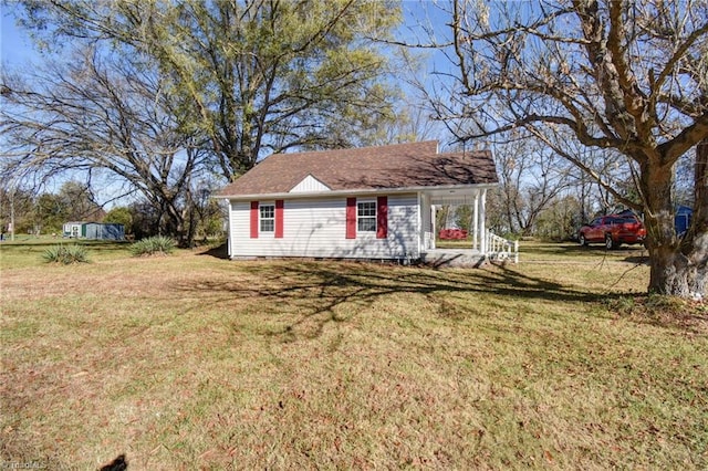 exterior space featuring a front yard