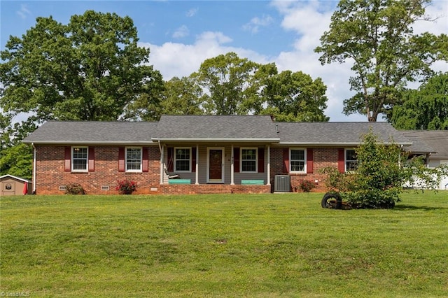 ranch-style home with covered porch, crawl space, a front lawn, and brick siding