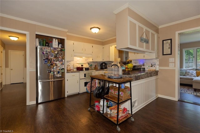 kitchen with freestanding refrigerator, range with two ovens, under cabinet range hood, and dark wood-style floors
