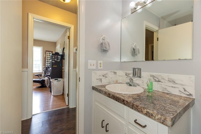 bathroom featuring vanity and wood finished floors