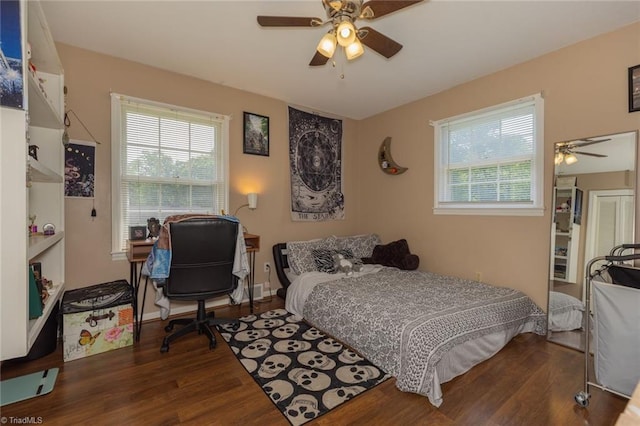 bedroom featuring a ceiling fan and wood finished floors