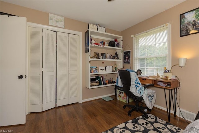 office area with baseboards and wood finished floors