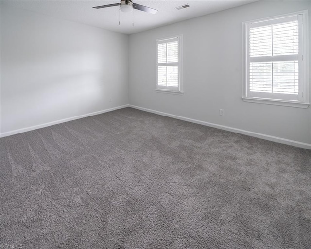909 Shelby Dr Unit B, Greensboro, NC 27409 - spare room with ceiling fan, baseboards, and carpet floors