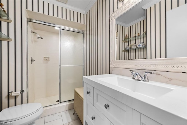 bathroom with toilet, an enclosed shower, crown molding, and vanity