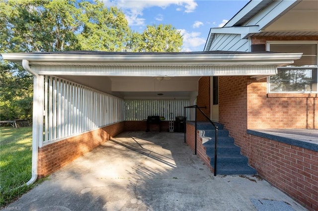 view of vehicle parking with a carport