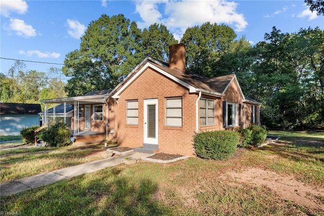 exterior space with a front lawn