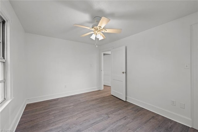 unfurnished room featuring ceiling fan and hardwood / wood-style floors