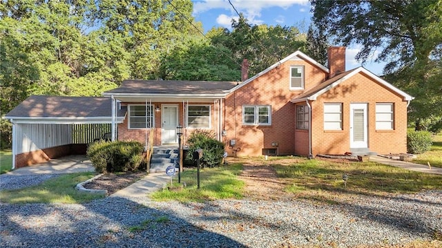 view of front of home with a carport