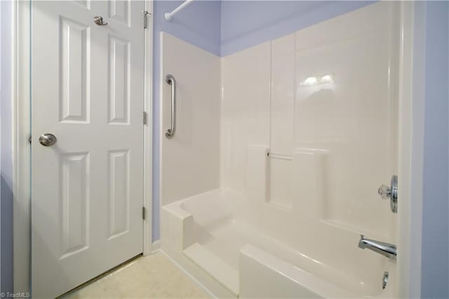 bathroom featuring washtub / shower combination