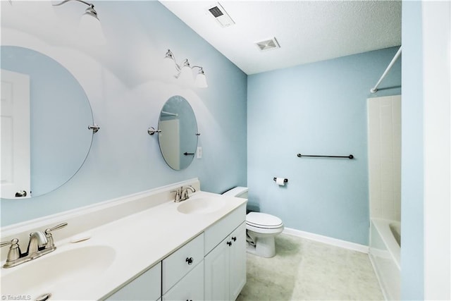 full bathroom with vanity, shower / bathing tub combination, and toilet