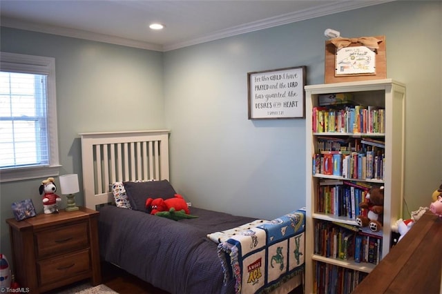 bedroom with ornamental molding