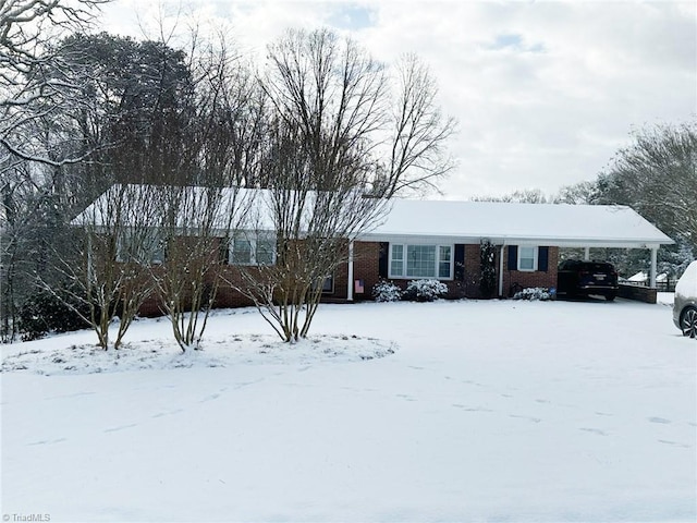 view of front of house with a carport