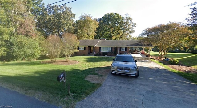 ranch-style home with a front lawn