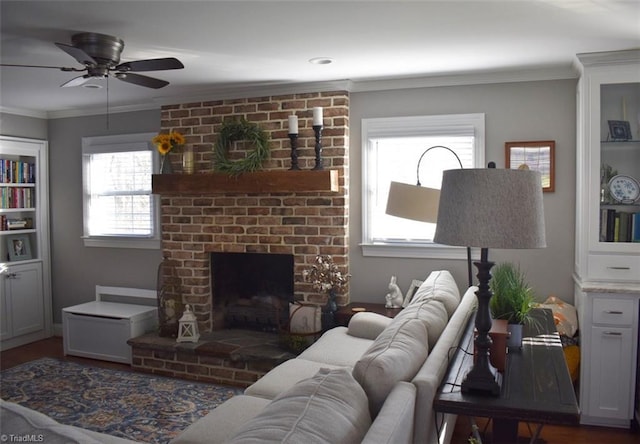 living room featuring a brick fireplace, ornamental molding, and ceiling fan