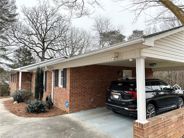 view of property exterior featuring a carport