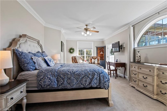 bedroom featuring light carpet, ceiling fan, baseboards, and crown molding