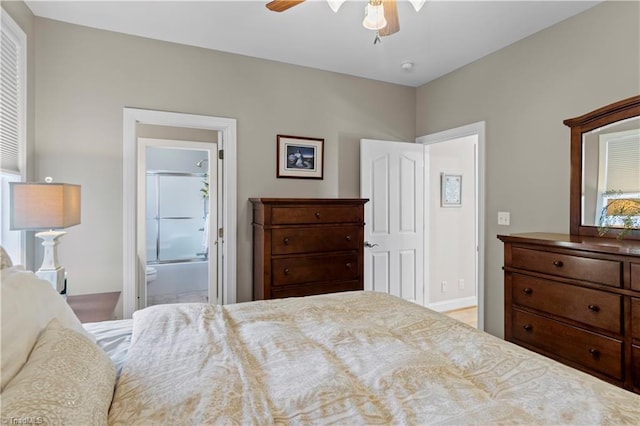 bedroom with a ceiling fan and connected bathroom