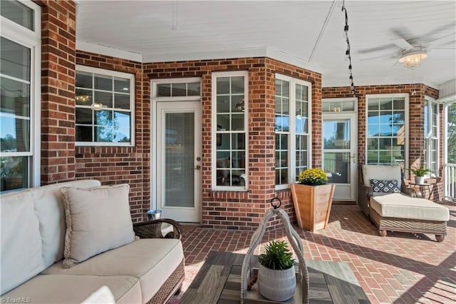 view of patio featuring a porch, ceiling fan, and an outdoor hangout area