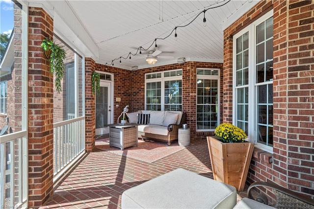 deck with an outdoor hangout area and a ceiling fan