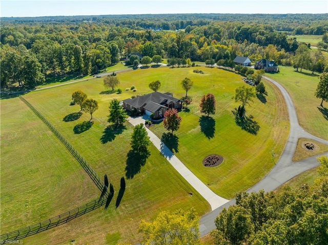 aerial view with a rural view and a view of trees