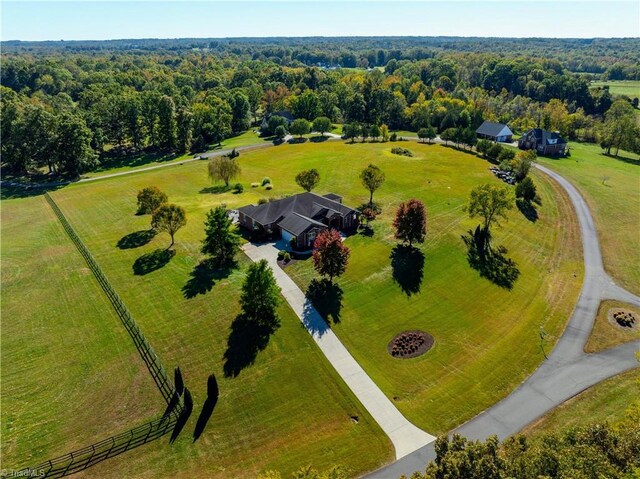 bird's eye view with a rural view and a forest view