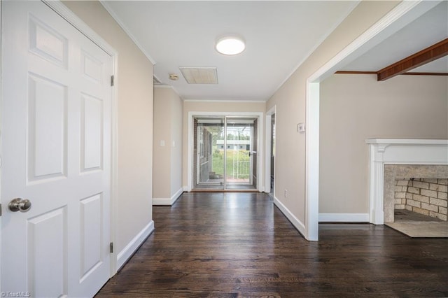 8521 US Highway 64 E, Ramseur, NC 27316 - entryway featuring crown molding, wood finished floors, baseboards, and a fireplace with flush hearth