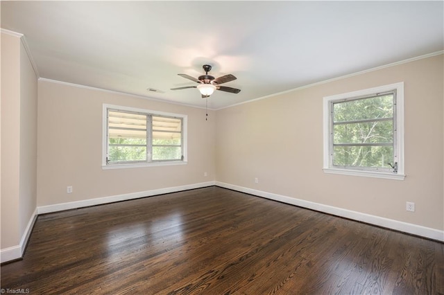 8521 US Highway 64 E, Ramseur, NC 27316 - unfurnished room featuring plenty of natural light, baseboards, crown molding, and dark wood-style floors