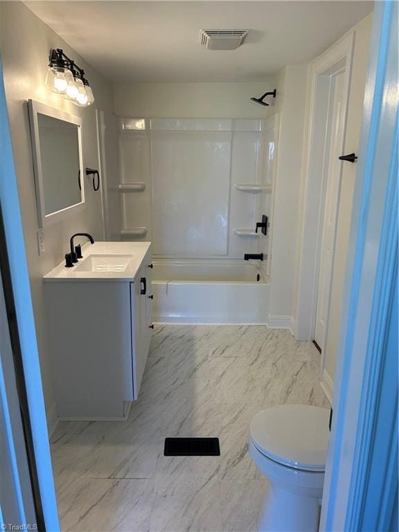 bathroom featuring visible vents, toilet, vanity, shower / tub combination, and marble finish floor