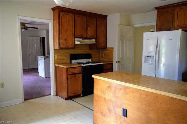 kitchen with decorative backsplash, white appliances, and ceiling fan