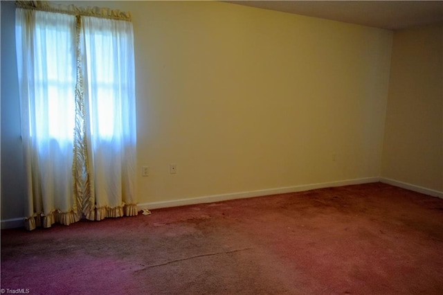 view of carpeted spare room