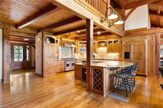 7239 Bulb Rd, Julian, NC 27283 - kitchen featuring high quality appliances, a wooden ceiling with exposed beams, light wood-style floors, exhaust hood, and glass insert cabinets