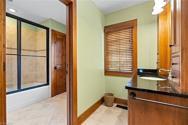 7239 Bulb Rd, Julian, NC 27283 - bathroom with tile patterned floors, vanity, and combined bath / shower with glass door