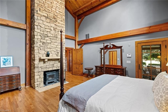 7239 Bulb Rd, Julian, NC 27283 - bedroom featuring access to outside, wood finished floors, high vaulted ceiling, and a wood ceiling with exposed beams