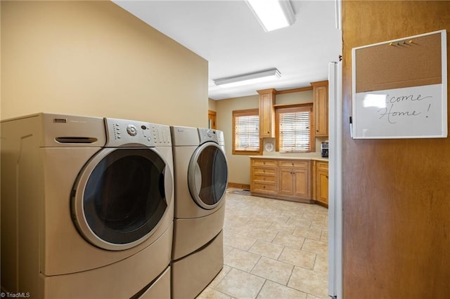 7239 Bulb Rd, Julian, NC 27283 - laundry room with independent washer and dryer and light tile patterned floors