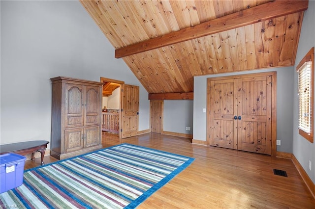 7239 Bulb Rd, Julian, NC 27283 - unfurnished bedroom featuring wood finished floors and wooden ceiling