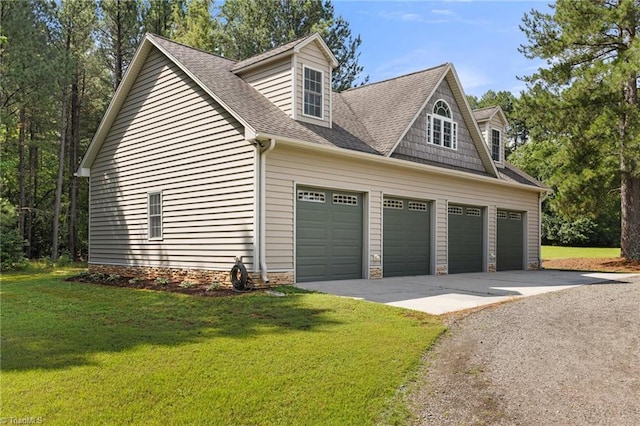 7239 Bulb Rd, Julian, NC 27283 - view of side of home featuring asphalt driveway, a yard, an attached garage, roof with shingles, and stone siding