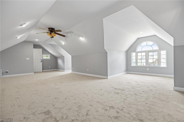 7239 Bulb Rd, Julian, NC 27283 - additional living space with vaulted ceiling, carpet flooring, and a ceiling fan